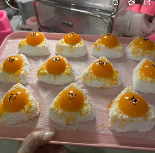 onigiri (Japanese rice ball with egg yolk) squishy toy